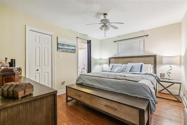 bedroom featuring dark hardwood / wood-style flooring, a closet, and ceiling fan