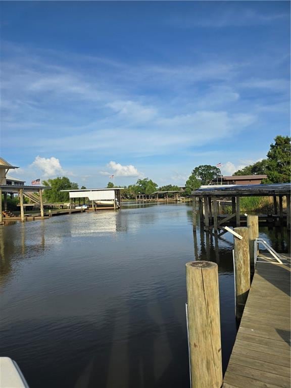 view of dock featuring a water view