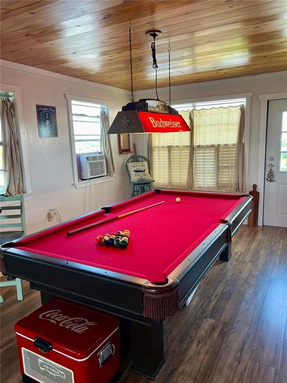 playroom featuring dark hardwood / wood-style flooring, pool table, cooling unit, and wood ceiling