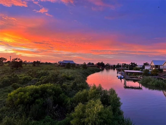 property view of water featuring a dock