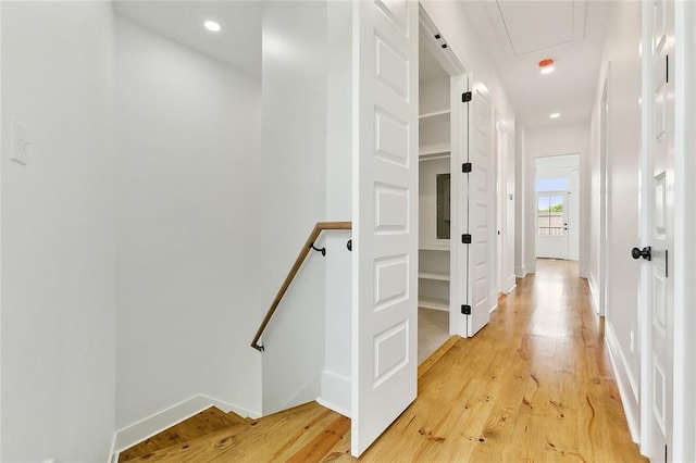 hallway with light wood-type flooring