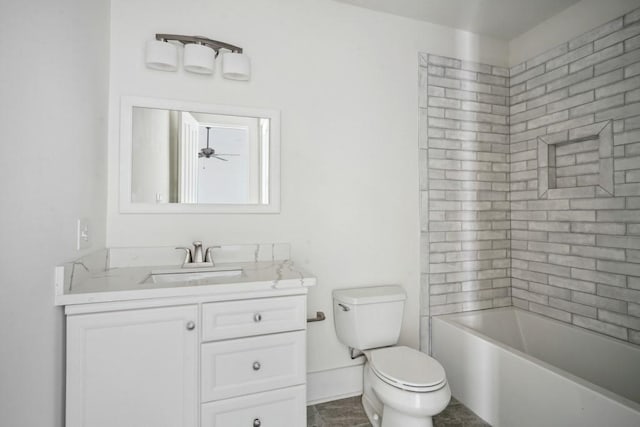 bathroom featuring ceiling fan, tile patterned floors, vanity, and toilet