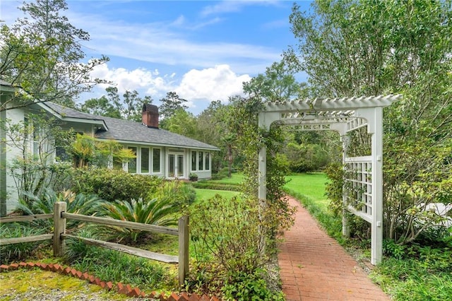 exterior space featuring a pergola