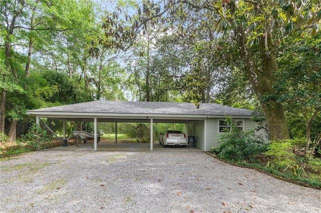 view of parking / parking lot with a carport