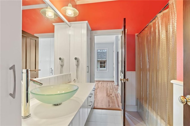 bathroom with vanity and hardwood / wood-style floors