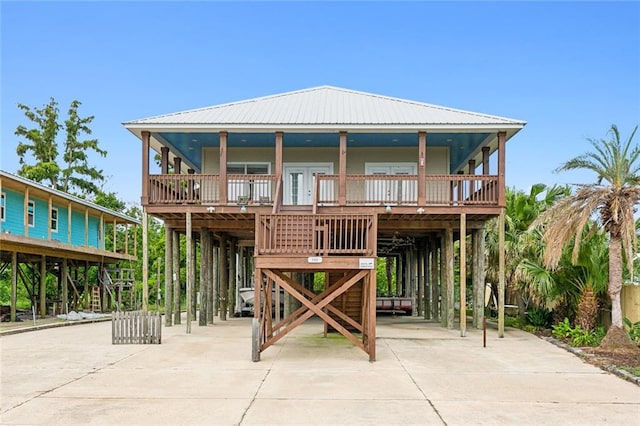 exterior space with a carport