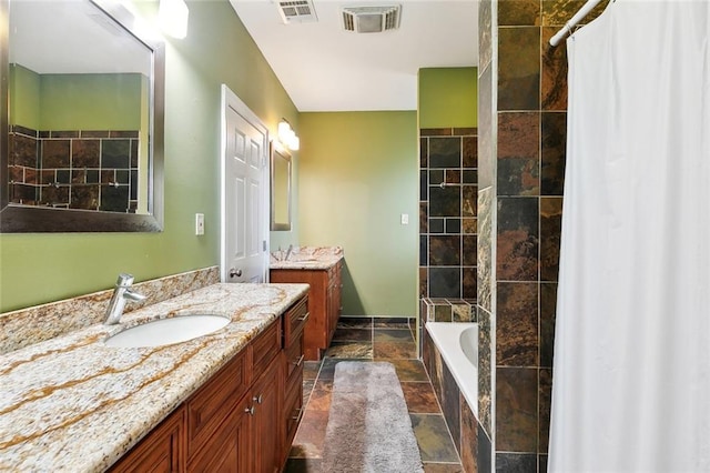 bathroom with vanity and tile patterned floors