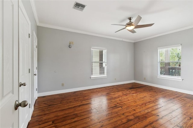 spare room featuring ornamental molding, hardwood / wood-style floors, and ceiling fan