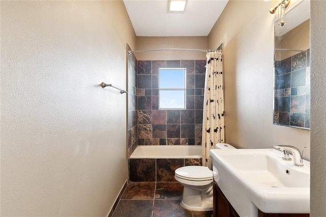 full bathroom with vanity, toilet, tile patterned floors, and shower / bath combo