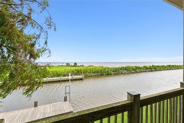 view of dock with a water view