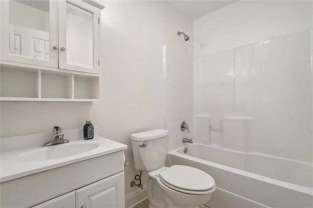 full bathroom featuring tile patterned flooring, bathtub / shower combination, toilet, and vanity