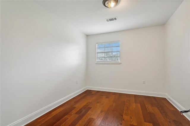 empty room featuring hardwood / wood-style floors