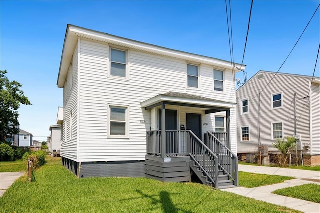 view of front of house with a front lawn