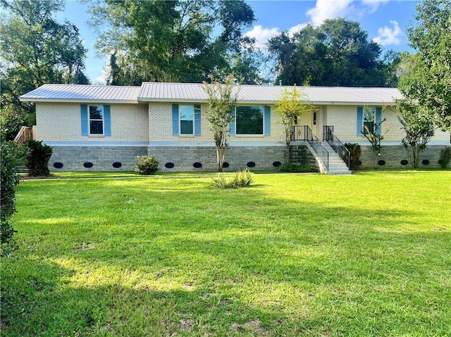 ranch-style home with a front yard