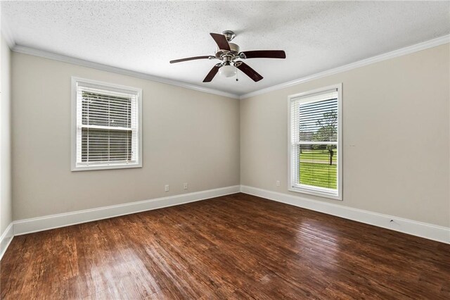 unfurnished room featuring a textured ceiling, ceiling fan, wood-type flooring, and ornamental molding