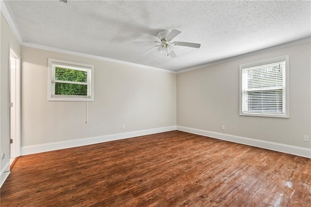 unfurnished room with a textured ceiling, a wealth of natural light, wood-type flooring, and ceiling fan