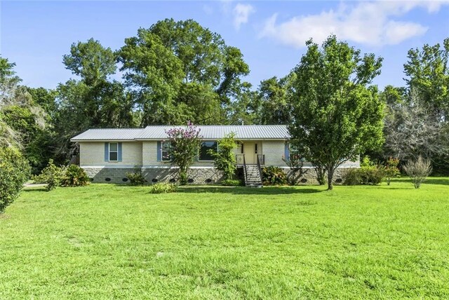 ranch-style house with a front yard