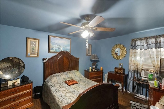 bedroom featuring ceiling fan and dark hardwood / wood-style flooring