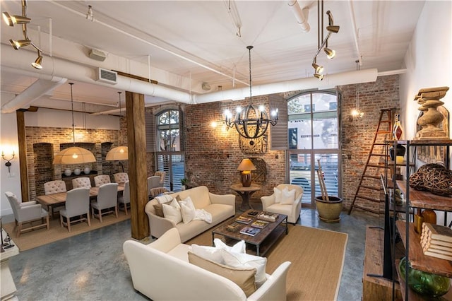 interior space with a fireplace, brick wall, and a chandelier