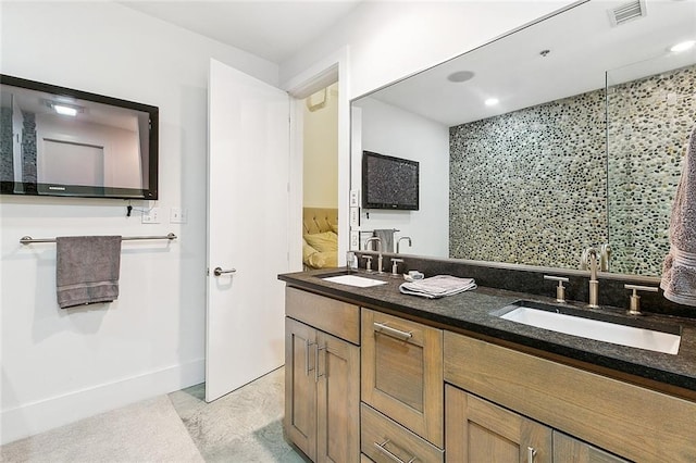 bathroom featuring vanity and walk in shower