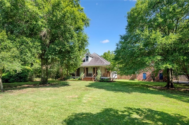 view of yard with a porch