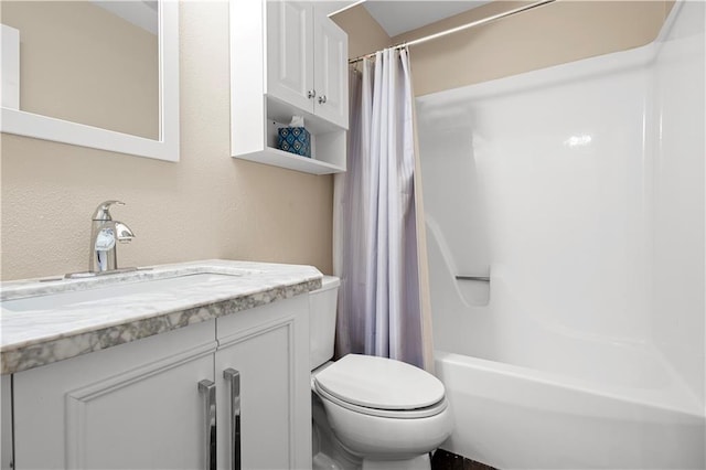 full bathroom with vanity, toilet, and shower / bath combo