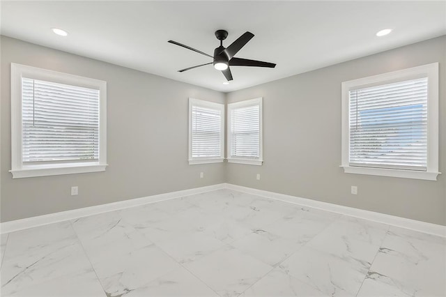 unfurnished room with ceiling fan