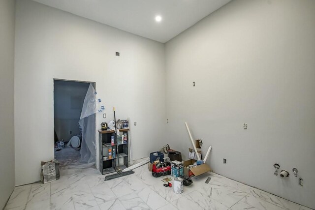 1936-1938 Franklin Ave, New Orleans, LA 70117 - empty room featuring marble look tile flooring