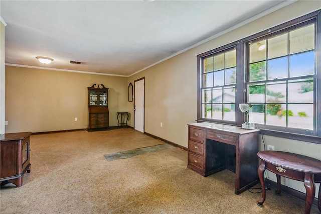 office featuring baseboards, ornamental molding, and light colored carpet