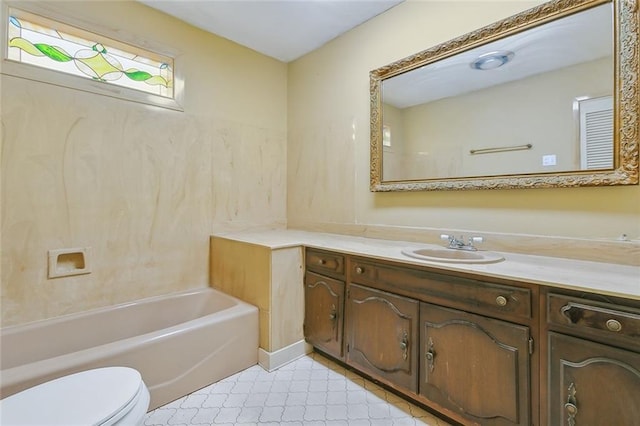 full bath with tile patterned floors, toilet, a bath, and vanity