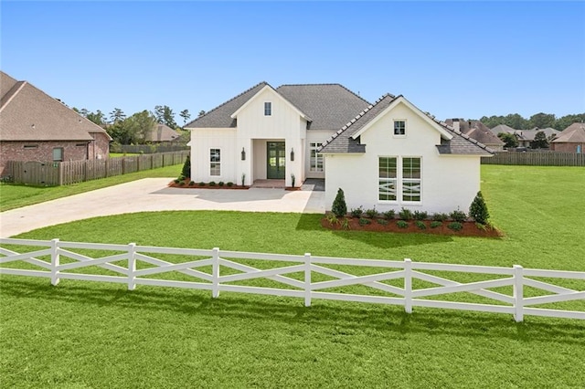 back of house featuring a yard