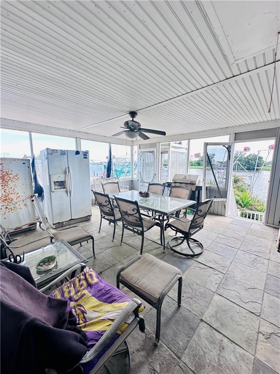 view of patio with ceiling fan