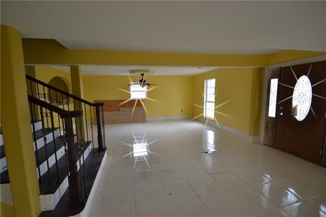 entrance foyer with tile patterned floors