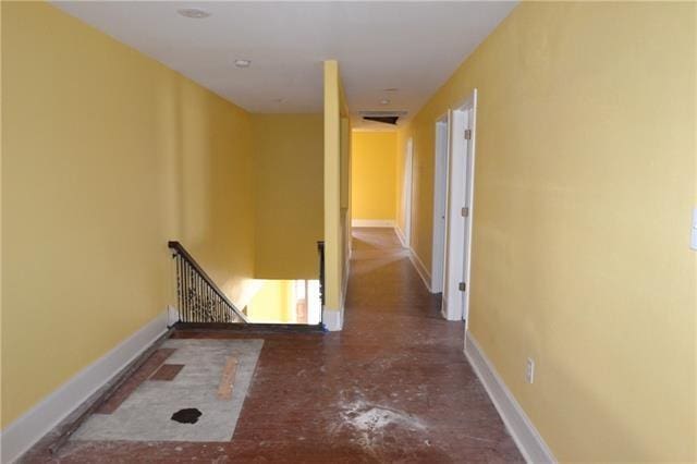 4682 Perrault Walk, New Orleans, LA 70127 - hallway with an upstairs landing and baseboards