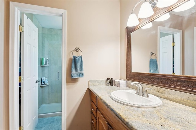 bathroom with vanity and walk in shower