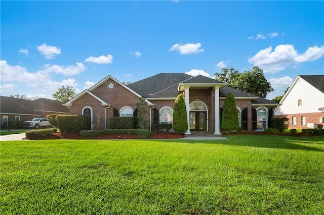 view of front of home with a front yard