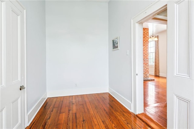 hall featuring wood-type flooring