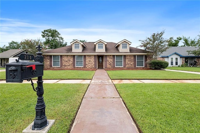 view of front of home with a front lawn