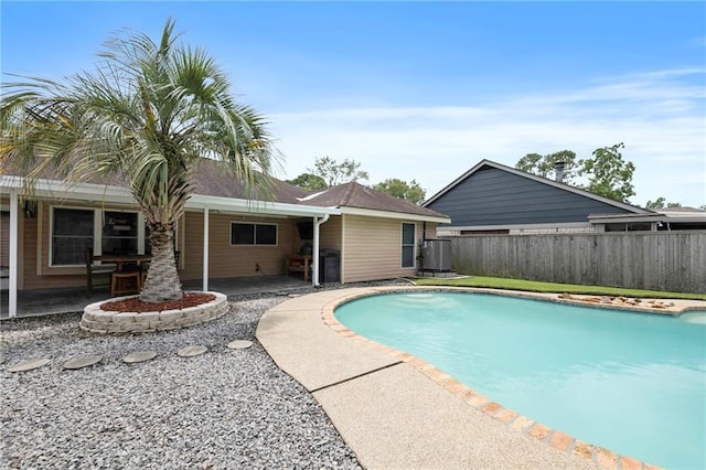 view of pool featuring a patio