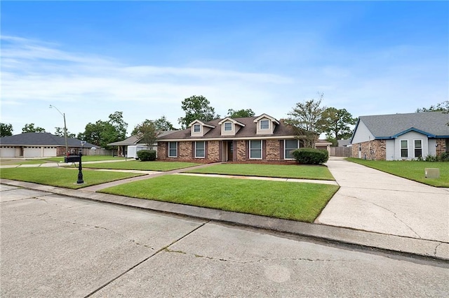 single story home featuring a front yard