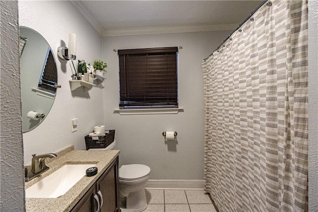 bathroom with vanity, toilet, crown molding, and tile patterned flooring