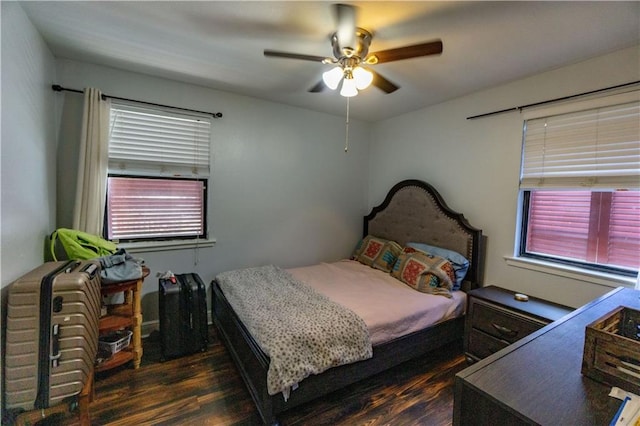 bedroom featuring hardwood / wood-style floors and ceiling fan