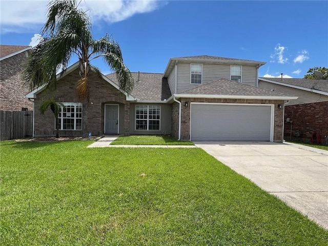 traditional home featuring a front yard, fence, concrete driveway, a garage, and brick siding