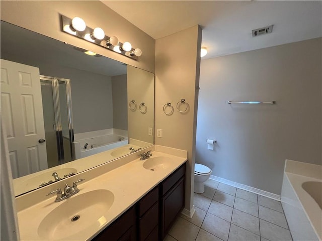 full bathroom featuring a bath, visible vents, and a sink