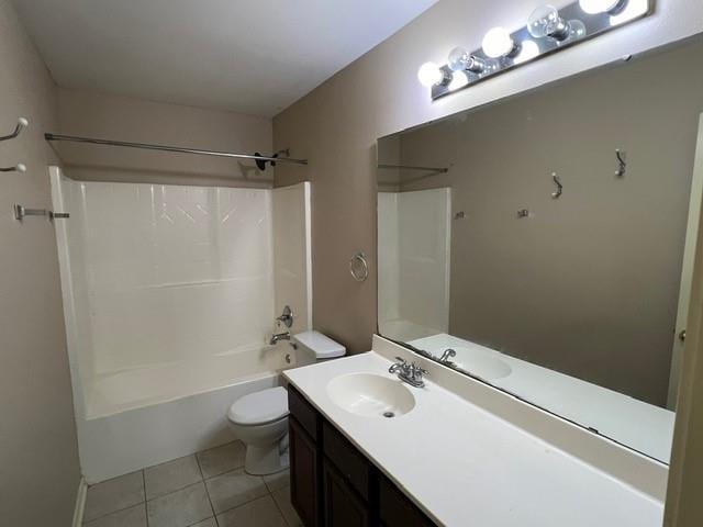 full bathroom featuring tile patterned floors, toilet, vanity, and shower / bath combination