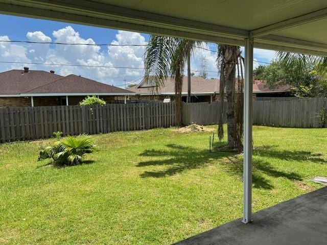 view of yard featuring a fenced backyard