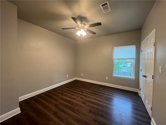 121618 Gordon St, New Orleans, LA 70117 - empty room with dark wood-style floors and ceiling fan