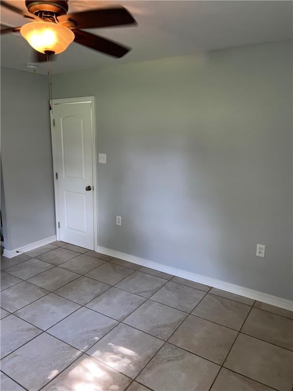 unfurnished bedroom featuring a closet and tile patterned floors