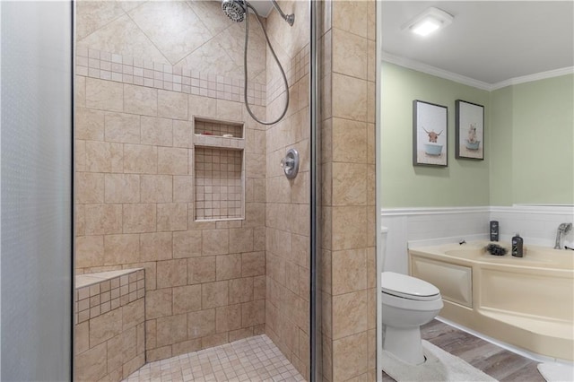 bathroom with crown molding, hardwood / wood-style flooring, toilet, and walk in shower