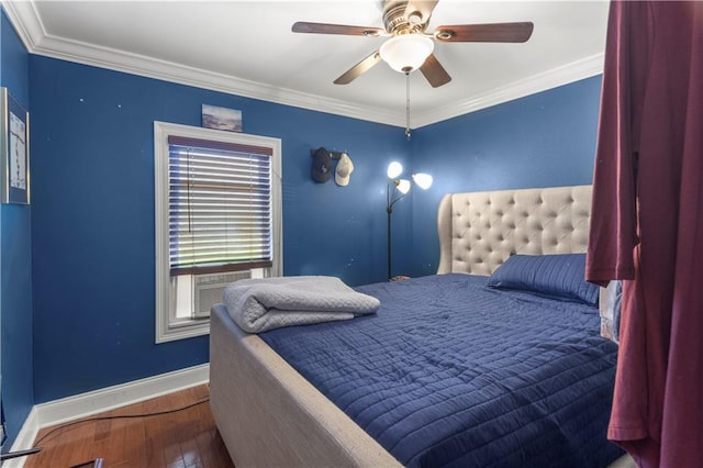 bedroom with ornamental molding, wood-type flooring, and ceiling fan